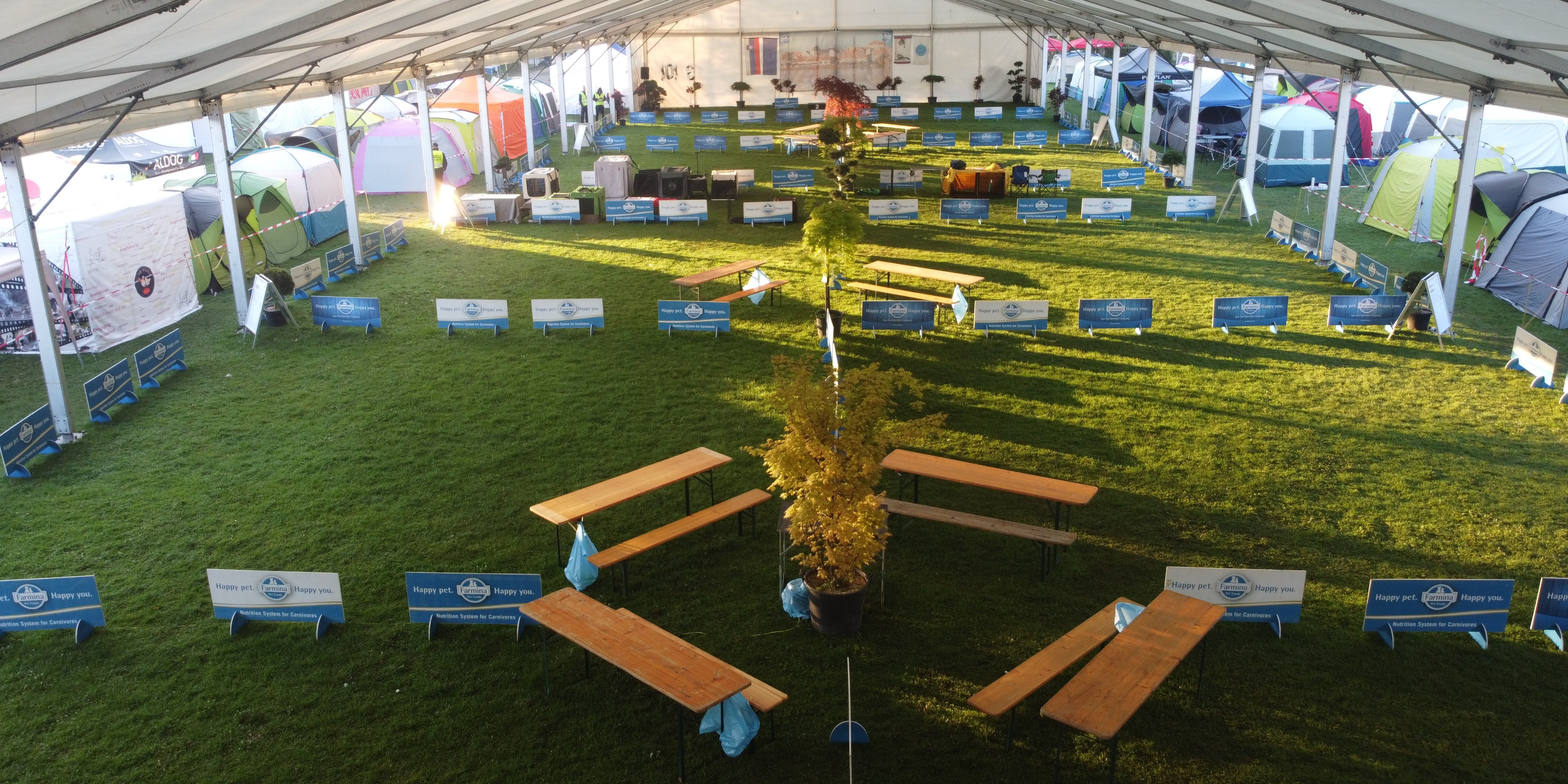 The show rings are set underneath a tent for protection against weather effects.